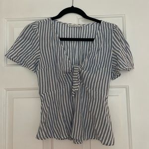 Blue and white stripe shirt with tie knot